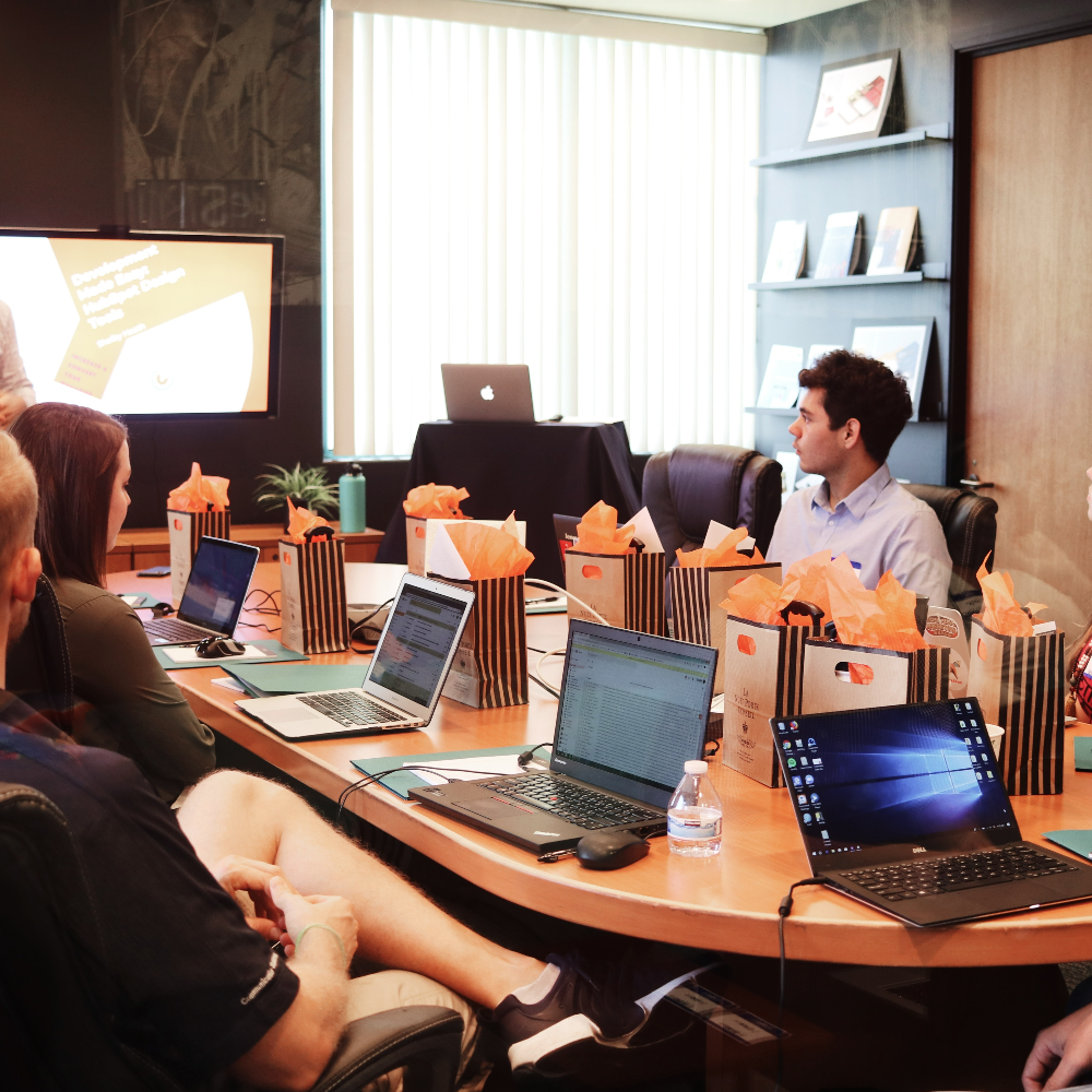 Deliver and train on both presentations and public speaking